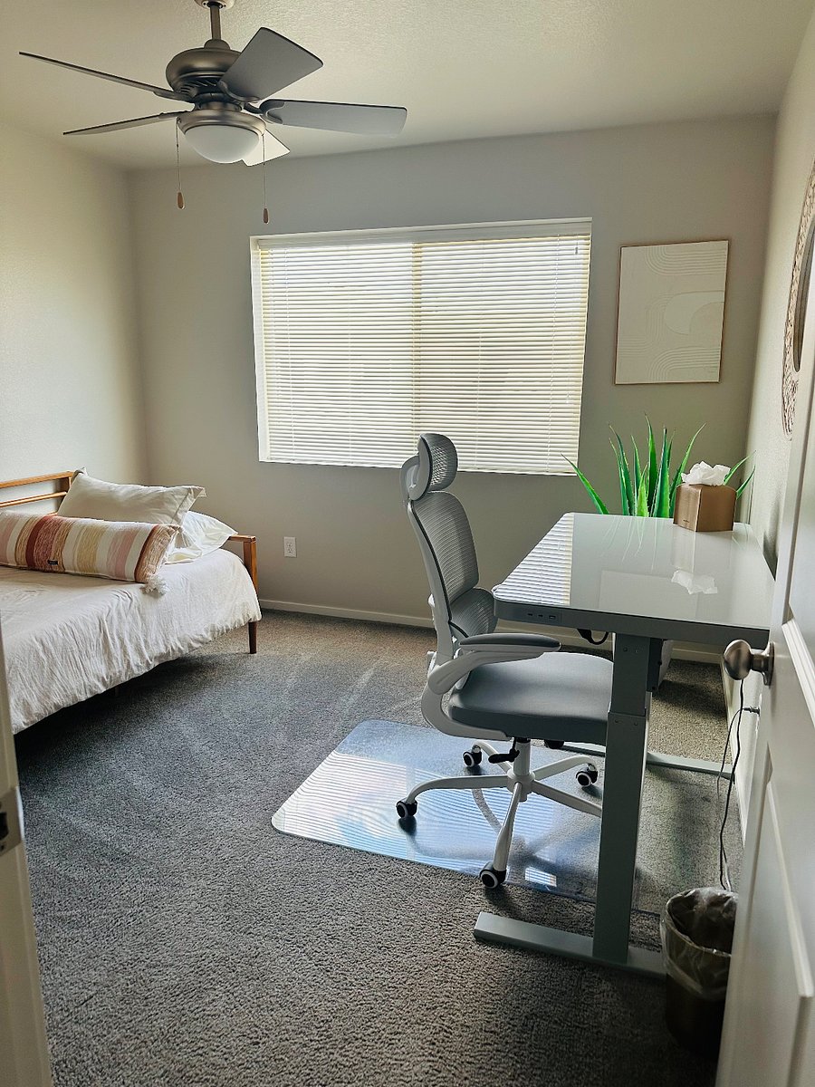 Dedicated workspace with standing desk.