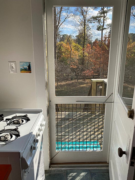 View from kitchen to backyard