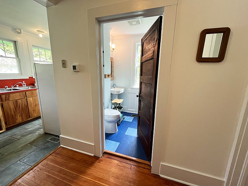 Bathroom and kitchen from hall