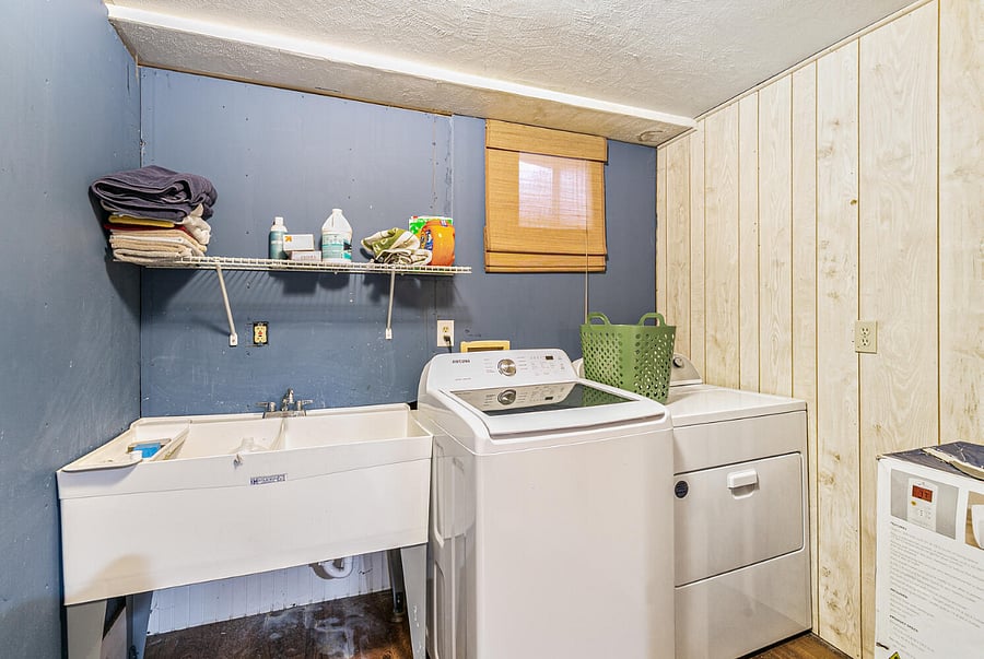 In-Unit Laundry: Full-sized washer/dryer + shelving