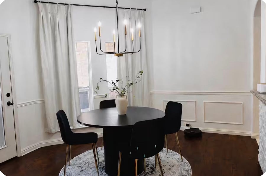 Bright breakfast nook with comfortable seating, perfect for morning coffee or casual meals.