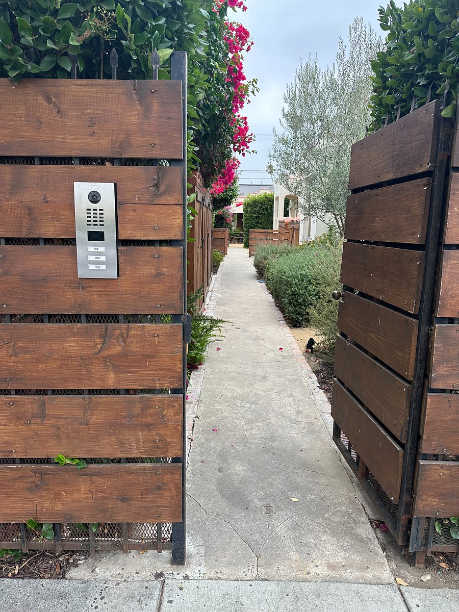 Front gate includes intercom/buzzer.