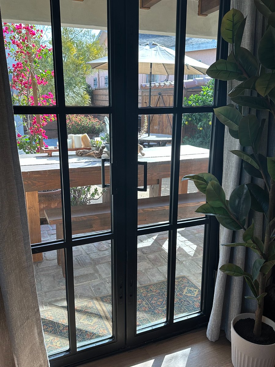 Doors from living room to the front porch.