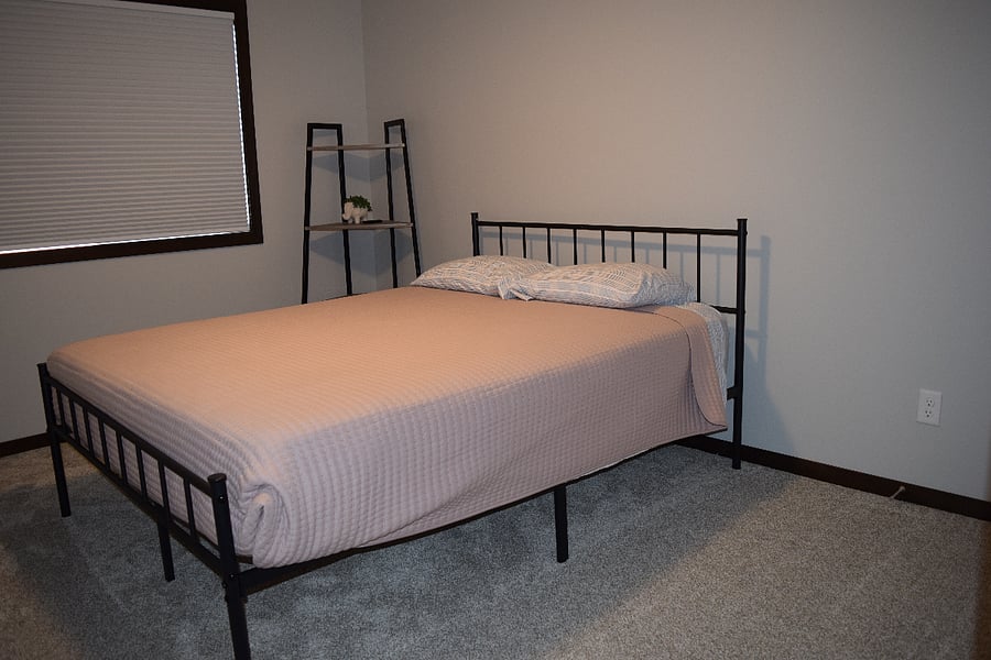 Bedroom 2 with queen bed and double closet.