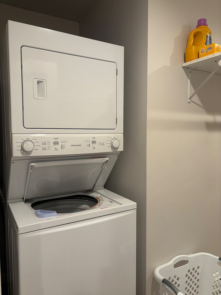 Stacking washer & dryer in master walk-in closet