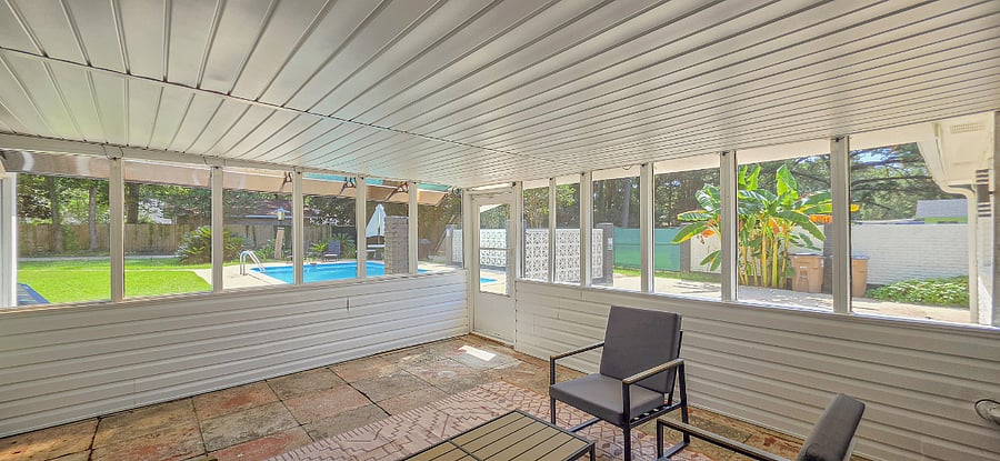 The screened-in porch is one of the shared common areas.
