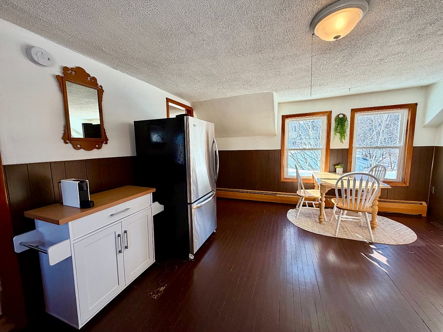 Kitchen with full sized fridge and coffee bar stocked with 1 month complimentary N'espresso pods
