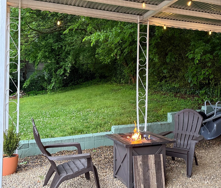 covered outdoor seating and firepit