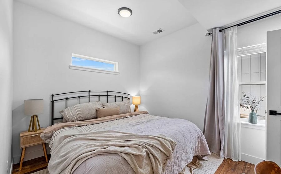 Master bedroom. King size bed with nightstands. Smart TV. Bathroom with walk in closet.