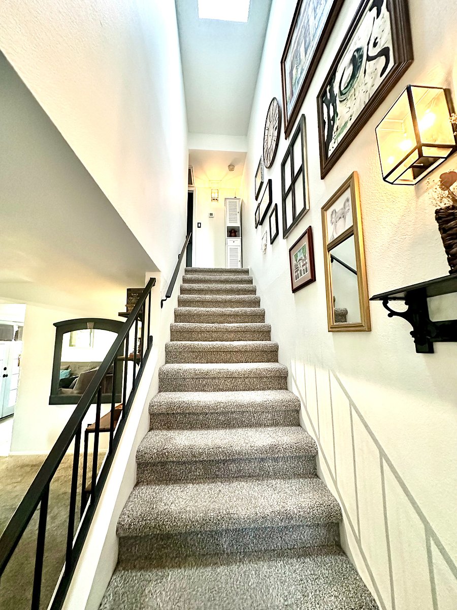 Stairs located near the landing by the front door