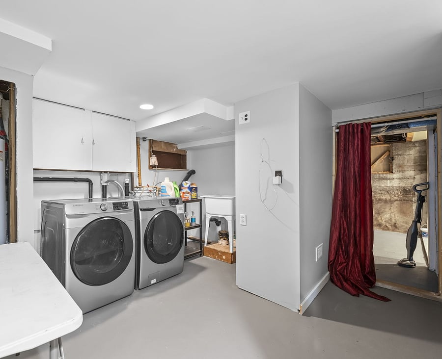 Laundry room on the lower/basement level. 
