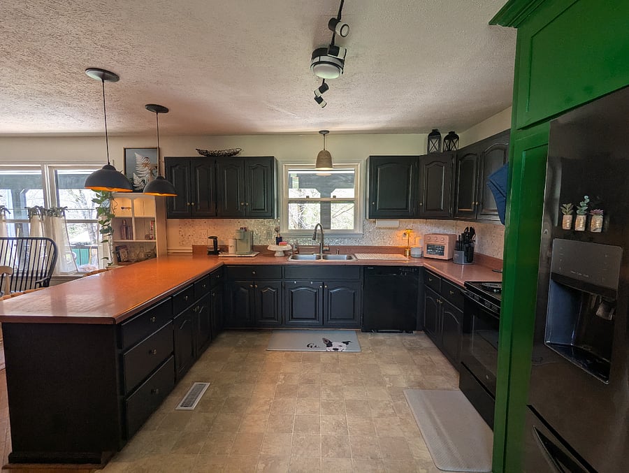 The kitchen has ample cabinet space and cooking essentials to make cooking at home a breeze