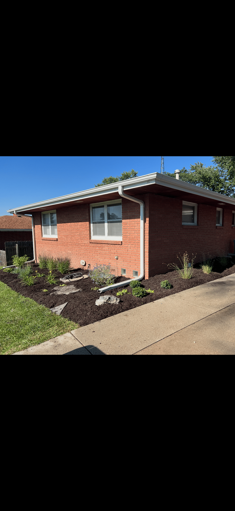 Beautifully maintained outdoor lawn and landscaping.