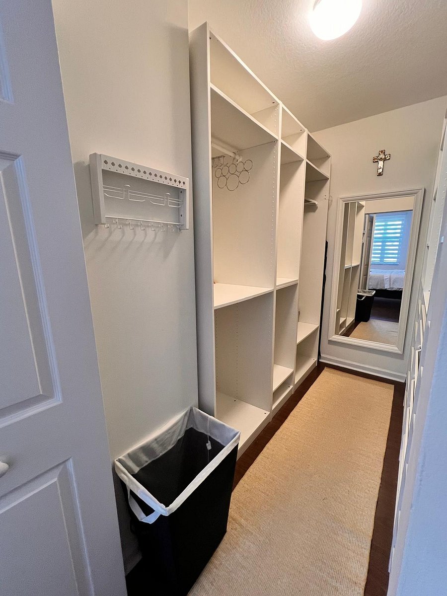 Walk-in closet with Laundry basket, Extra Set of Sheets & Pillowcases.