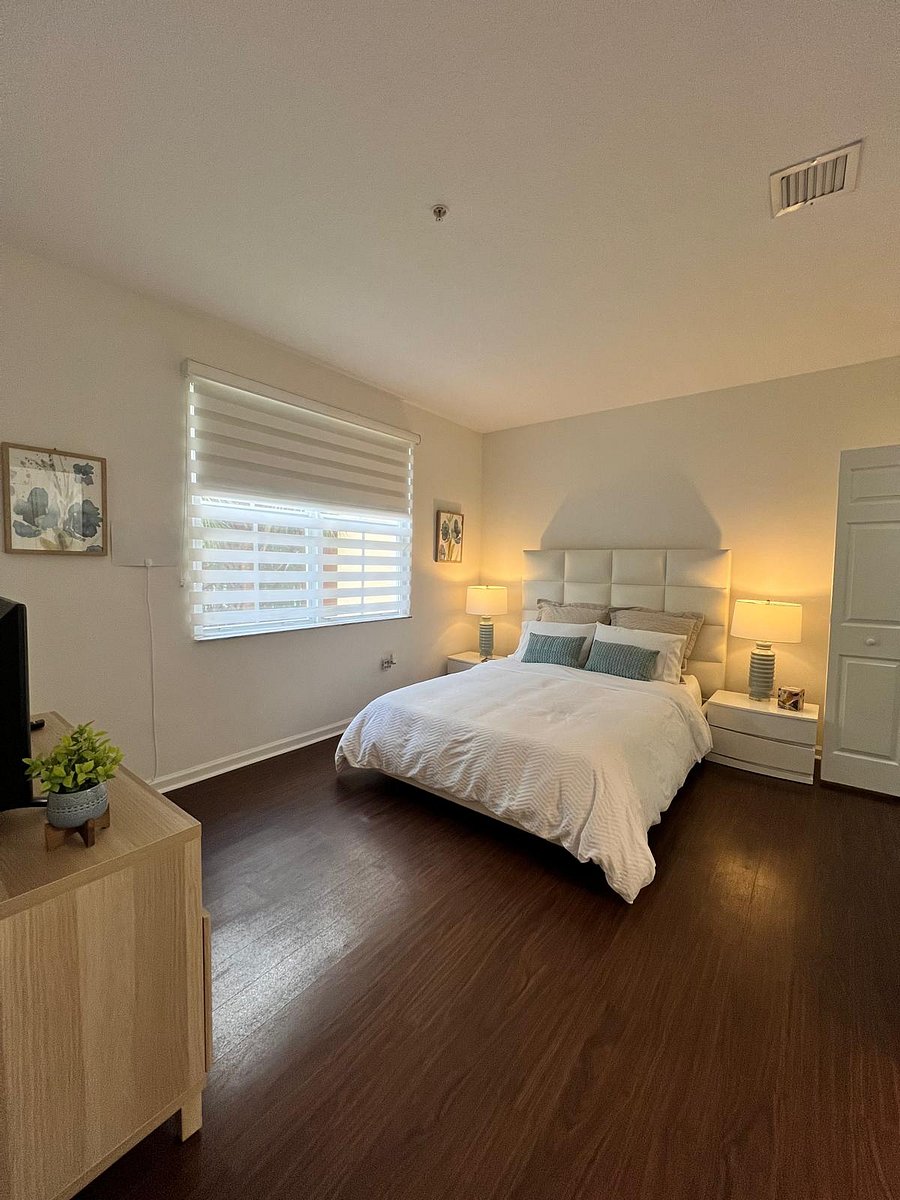 Guest Room with Zebra and Blackout Roller Curtains