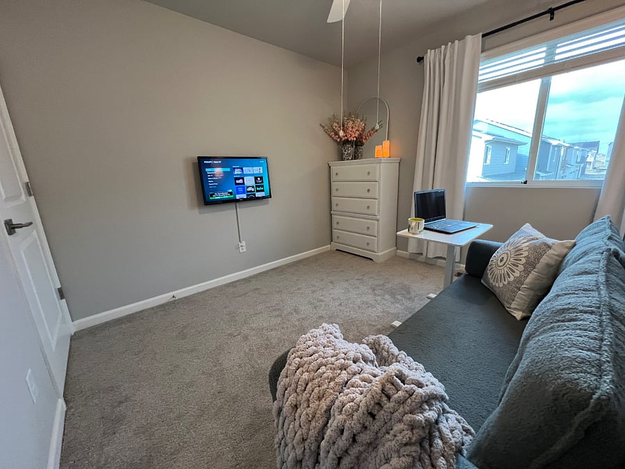 Smart TV mounted to wall.