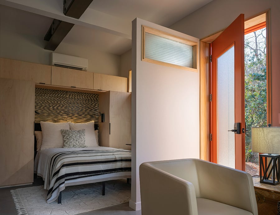 Private side entry with Schlage Encode lock.
Built in storage on either side of full size bed.