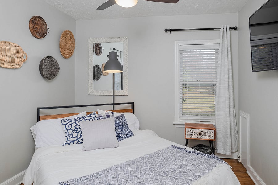 Bedroom with super comfortable queen bed and closet