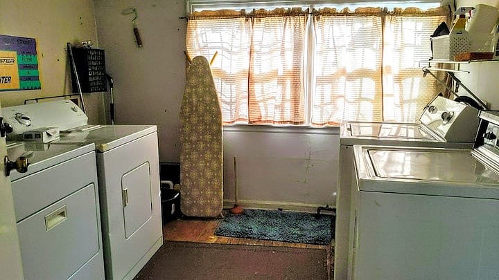 Laundry room. Each unit has a washer and dryer and entrance to the laundry room from inside their unit.