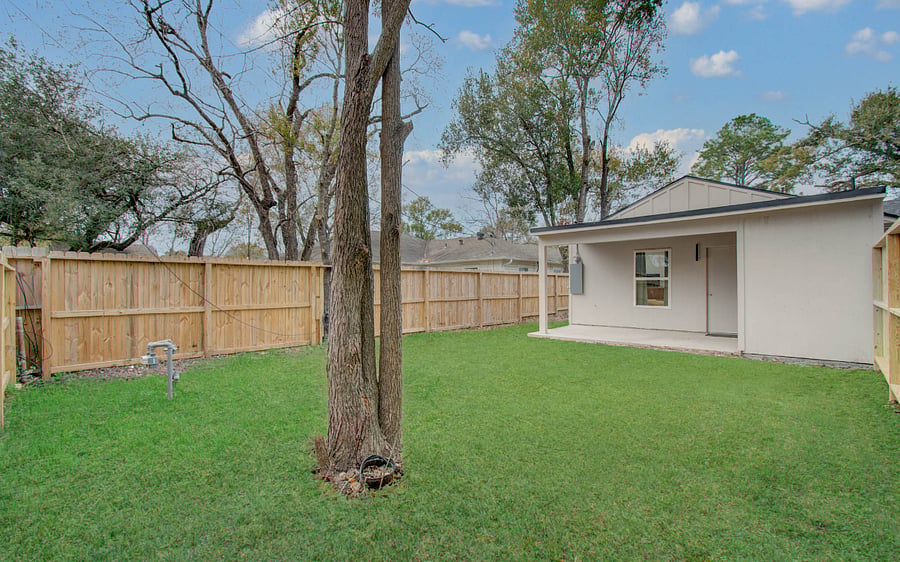 Private enclosed backyard and porch