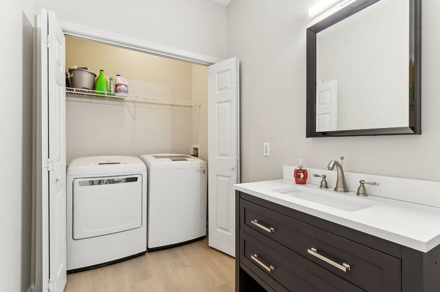 Full size washer and dryer in first floor powder room