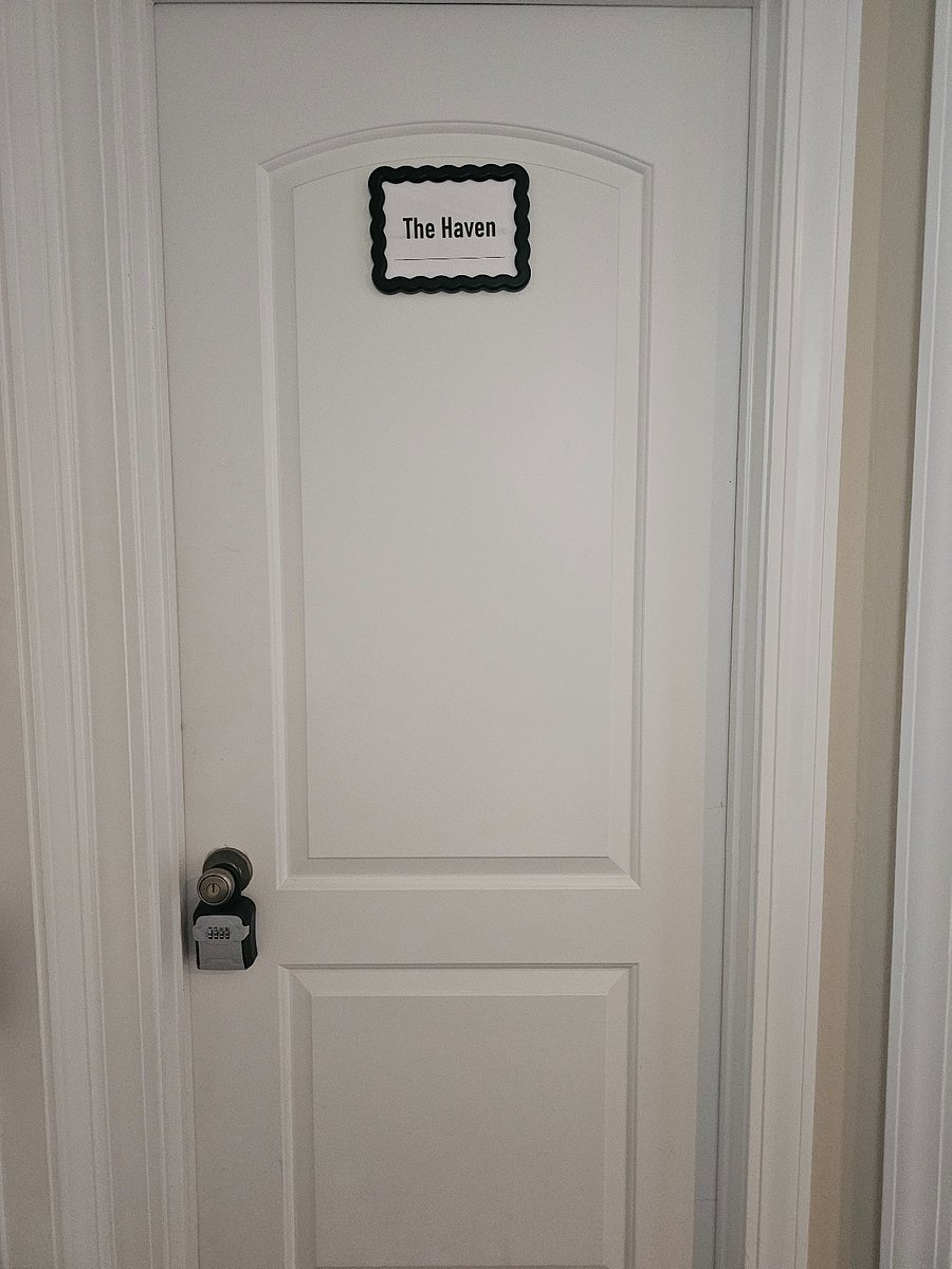Private bedroom door with lock and lock box. 