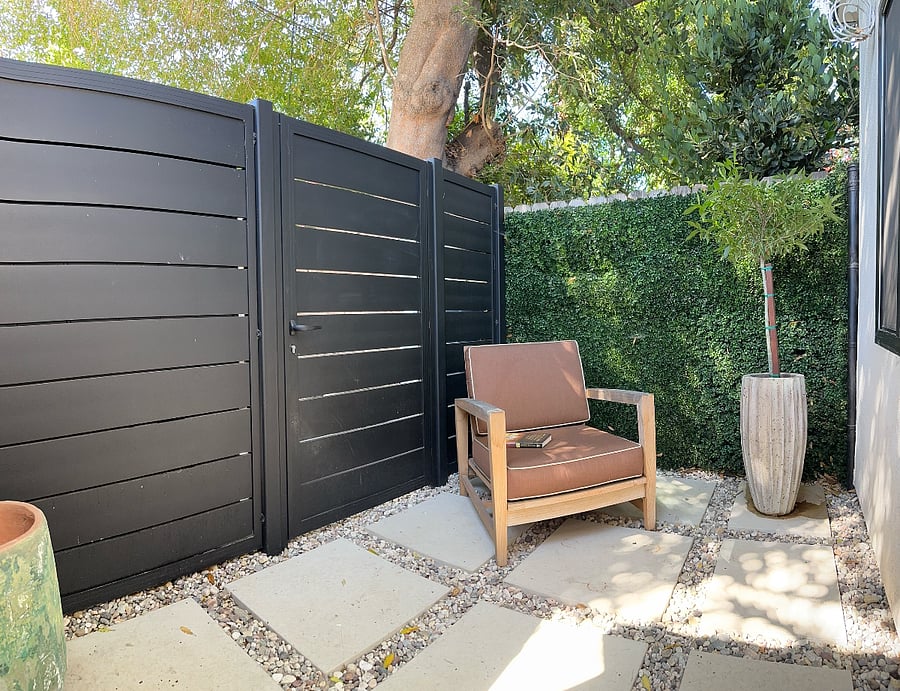 Private enclosed shaded back patio.