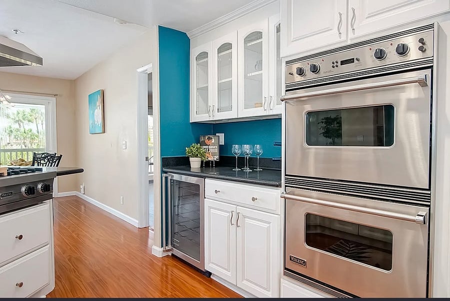 Viking double ovens and glass cabinetry