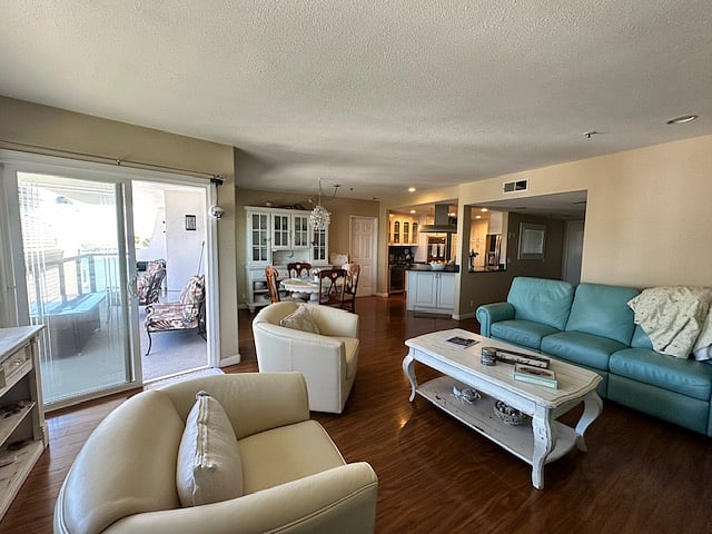 Spacious comfortable living room, kitchen and dining room with gorgeous views and all the amenities.