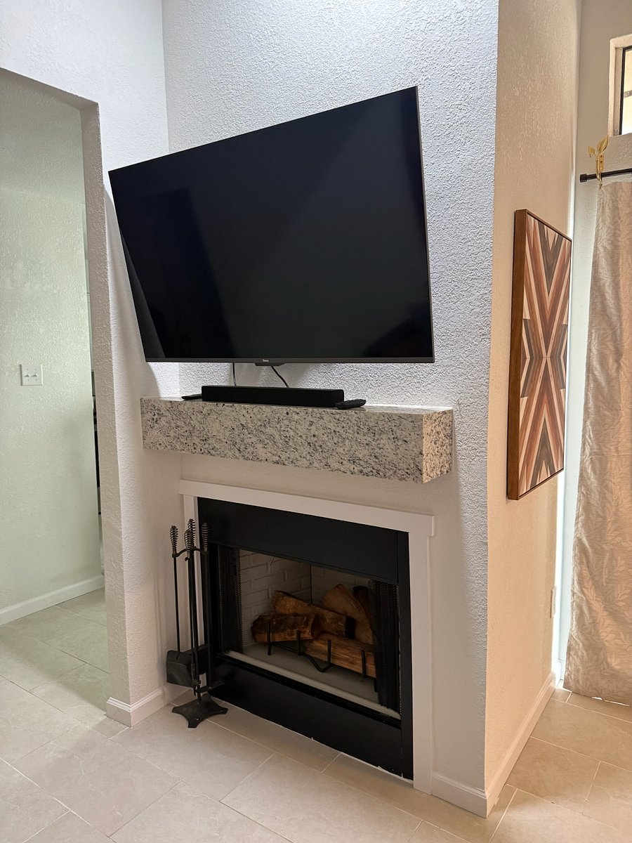 55" Smart TV, soundbar, wood burning fireplace