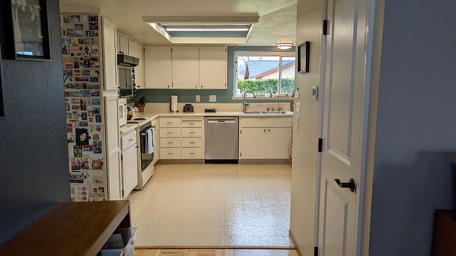 Entry way facing kitchen.