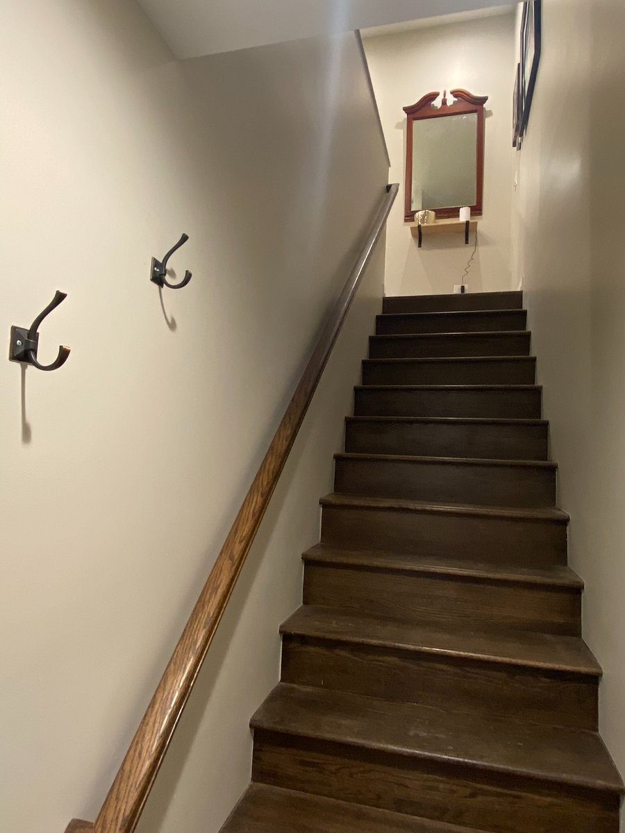 Entry landing at grade. Interior, stair to coach house unit. Fully private access.