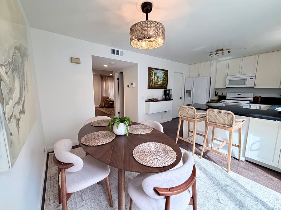 Bright dining space with seating for meals, games, or morning coffee.