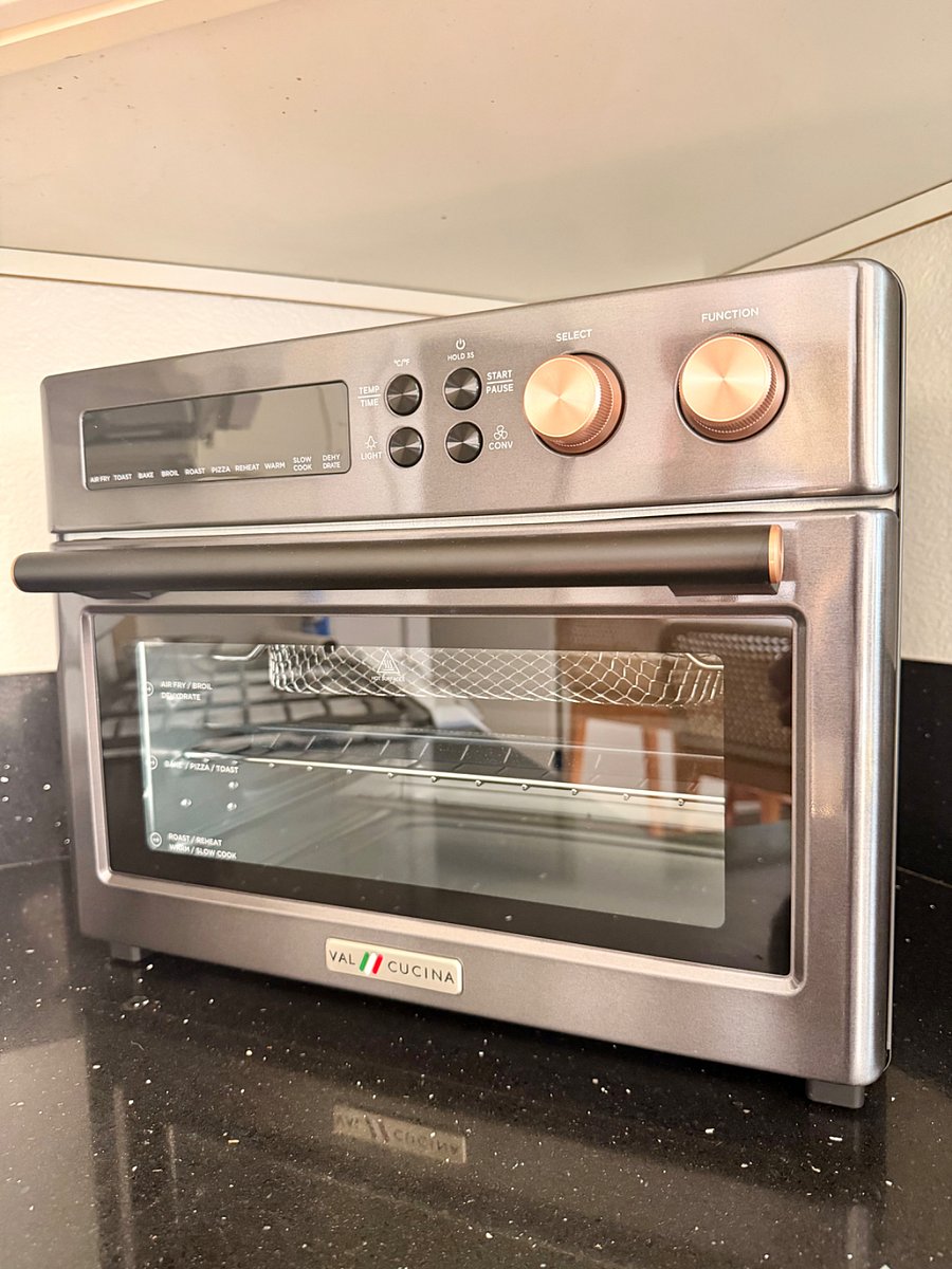 Multi-function countertop oven with air fry and convection settings for quick, easy meals.