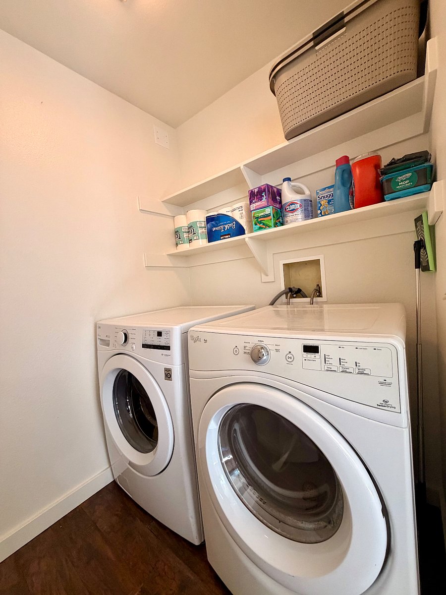 In-home washer and dryer with supplies provided  perfect for longer stays.