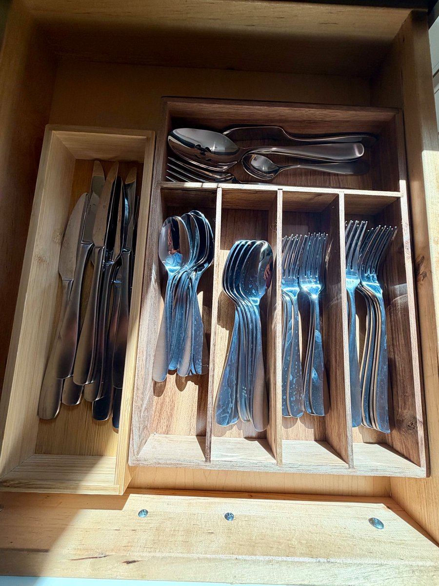 Organized flatware drawer stocked with everything you need for everyday dining.