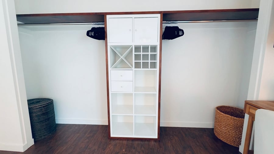 Large closet with ample storage and hanging space. 