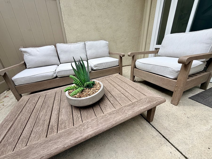 Cozy outdoor patio with comfortable seating, perfect for relaxing after work or enjoying morning coffee.
