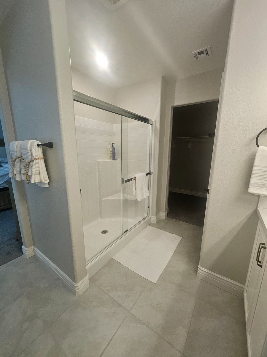 Master bedroom bathroom with shower, dual sinks. 
Towels included.
Hair dryer included.