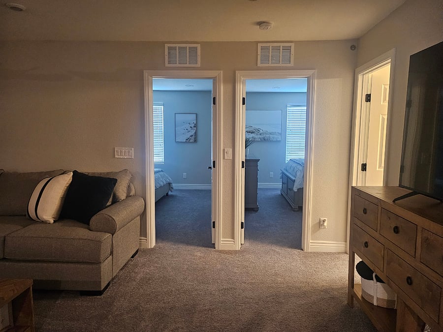 Upstairs view of the two bedrooms and shared bathroom on the right 