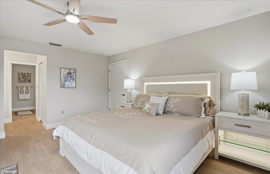 Master bedroom has en-suite makeup station, walk-in closet and bathroom with separate walk-in shower with sliding glass doors and bathtub area