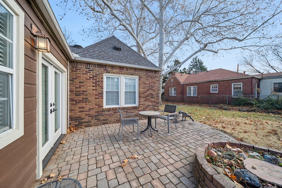 Step outside onto the private back patio, conveniently accessed directly from Bedroom #3. This peaceful outdoor space is a wonderful spot to enjoy your morning coffee, read a book, or relax after a busy day. With comfortable seating and a quiet setting, the patio extends your living space and provides a private retreat during your stay.