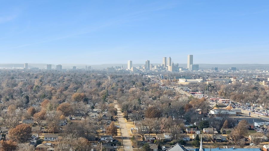 This aerial view highlights the home's excellent location in Midtown Tulsa, one of the city's most established and desirable neighborhoods. From here, you can see how close the home is to Downtown Tulsa, just minutes away. Guests enjoy convenient access to the BOK Center, Tulsa Expo Center, hospitals, restaurants, shopping, museums, entertainment, and many of Tulsa's most popular attractions. Midtown offers the perfect combination of historic charm, mature neighborhoods, and a central location, making this home an ideal place for both business and leisure travelers.