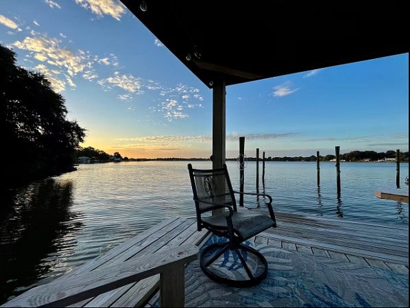 Relaxing lakefront setting with a private pier and beautiful sunset colors.