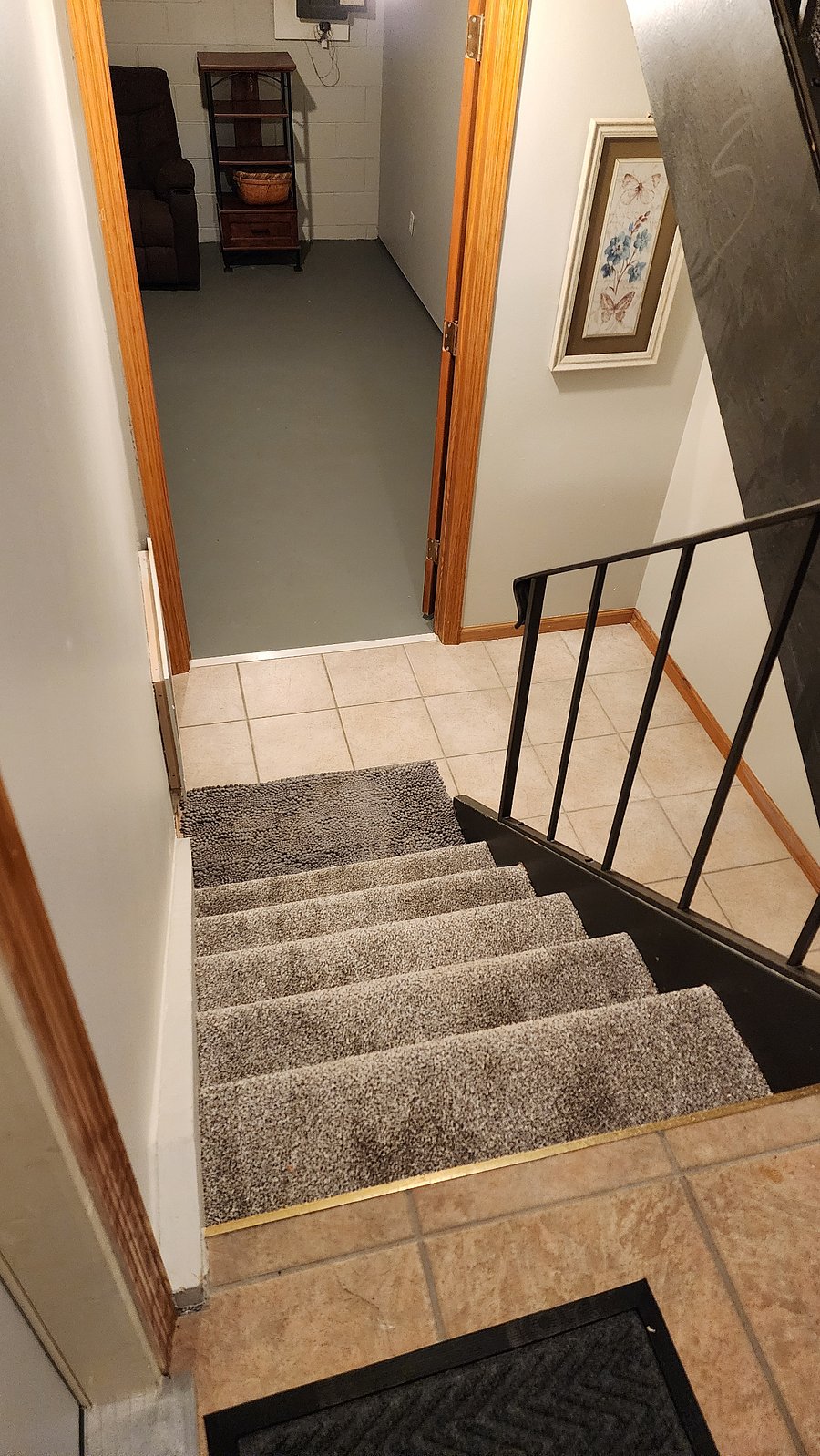 Stairs from entry area to basement where Laundy is located