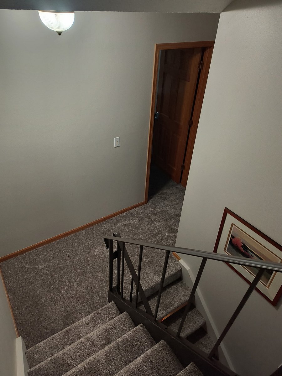 Stairs from 2nd floor bedrooms to main bedroom