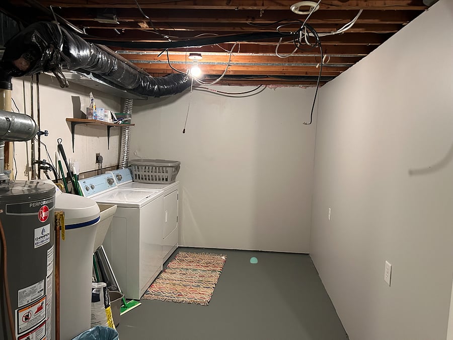 Laundry area in basement