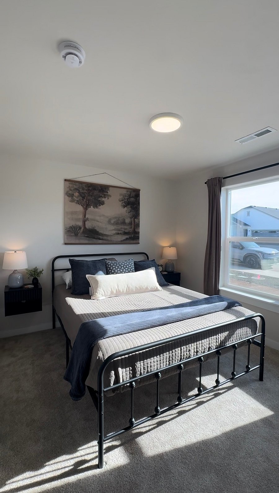 Guest bedroom 2. Queen memory foam bed, closet with hangers and suitcase stand