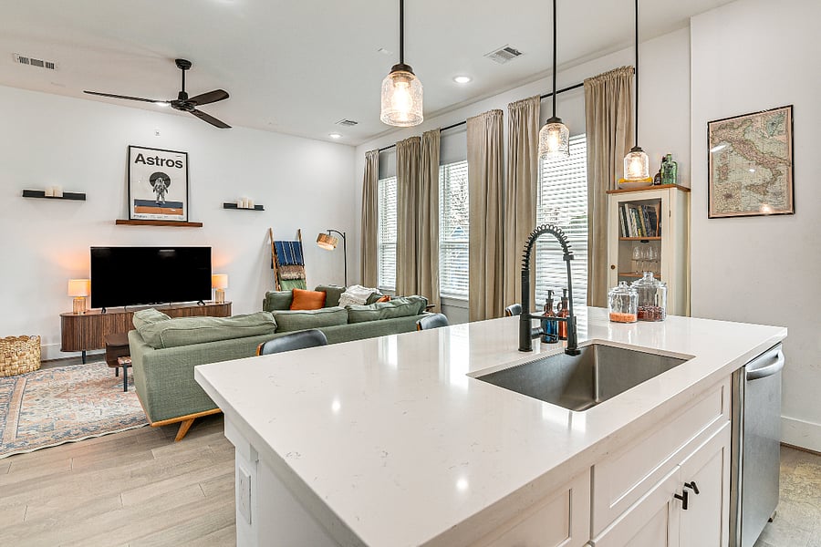Fully stocked kitchen (2nd Floor). Gas oven and stove. Counter seating for 3.