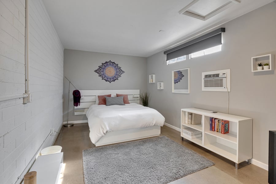 Fourth bedroom set up as a guest room w/queen bed & mattress topper. Featuring contemporary decor and dedicated AC unit